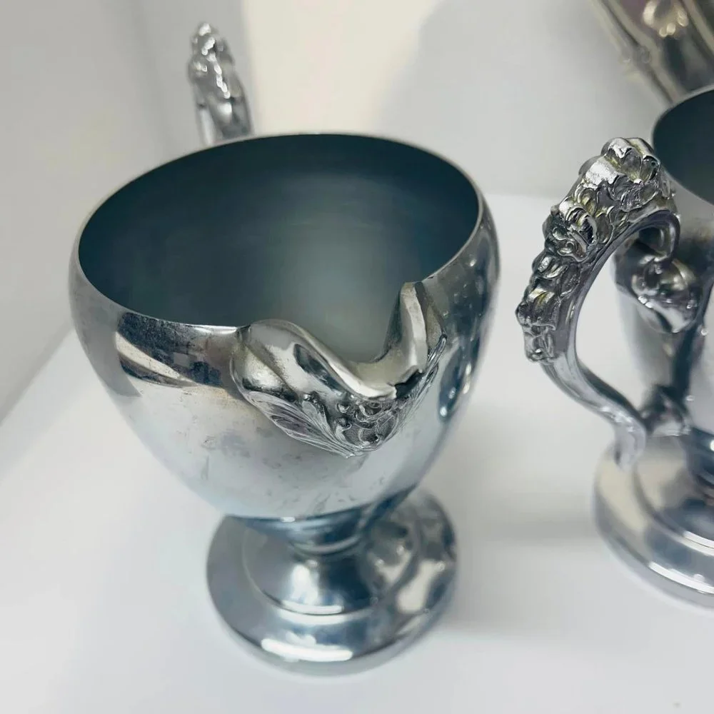 Silverplated ~stainless steel pieces. Tray, Teapot, 2 Sugar Bowls, 2 Creamers ~